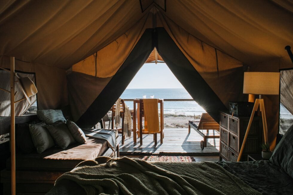 A tent with an ocean view from the inside.